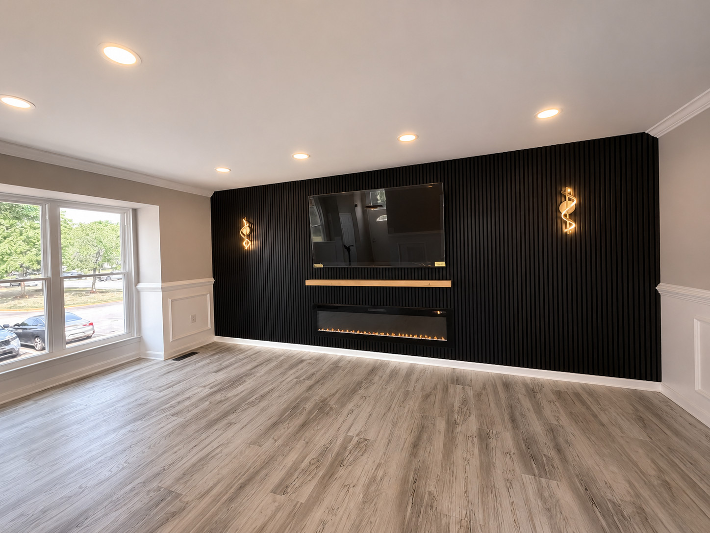 Professionally photographed modern living room with a feature wall and fireplace